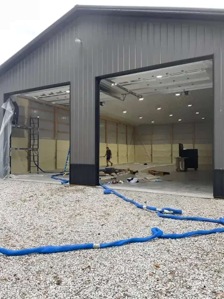 Pole barn spray foam insulation applied to metal building framing in Indiana