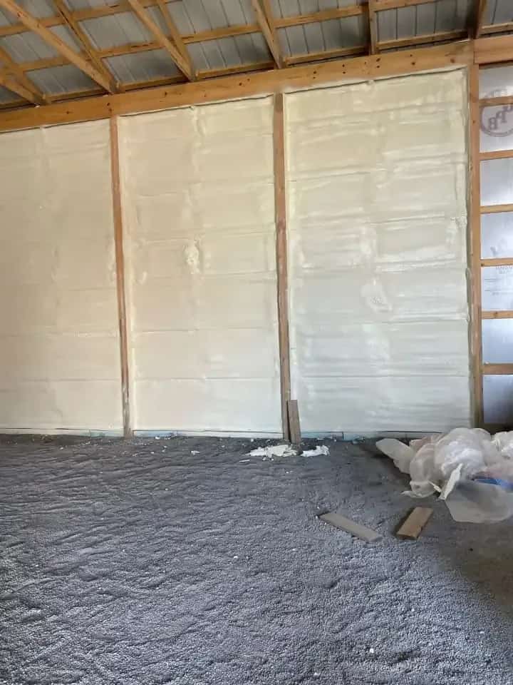 Spray foam insulation applied between wall studs in central Indiana
