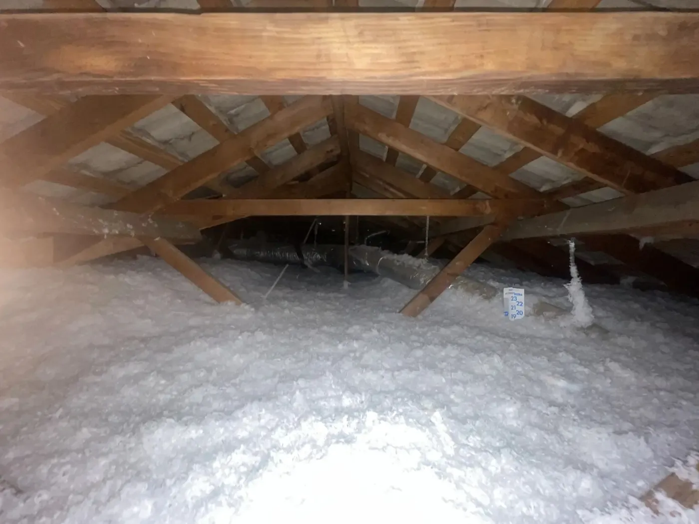 Attic insulation installed in a central Indiana home